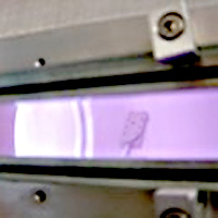 Figure 1. A helicon plasma used for materials processing